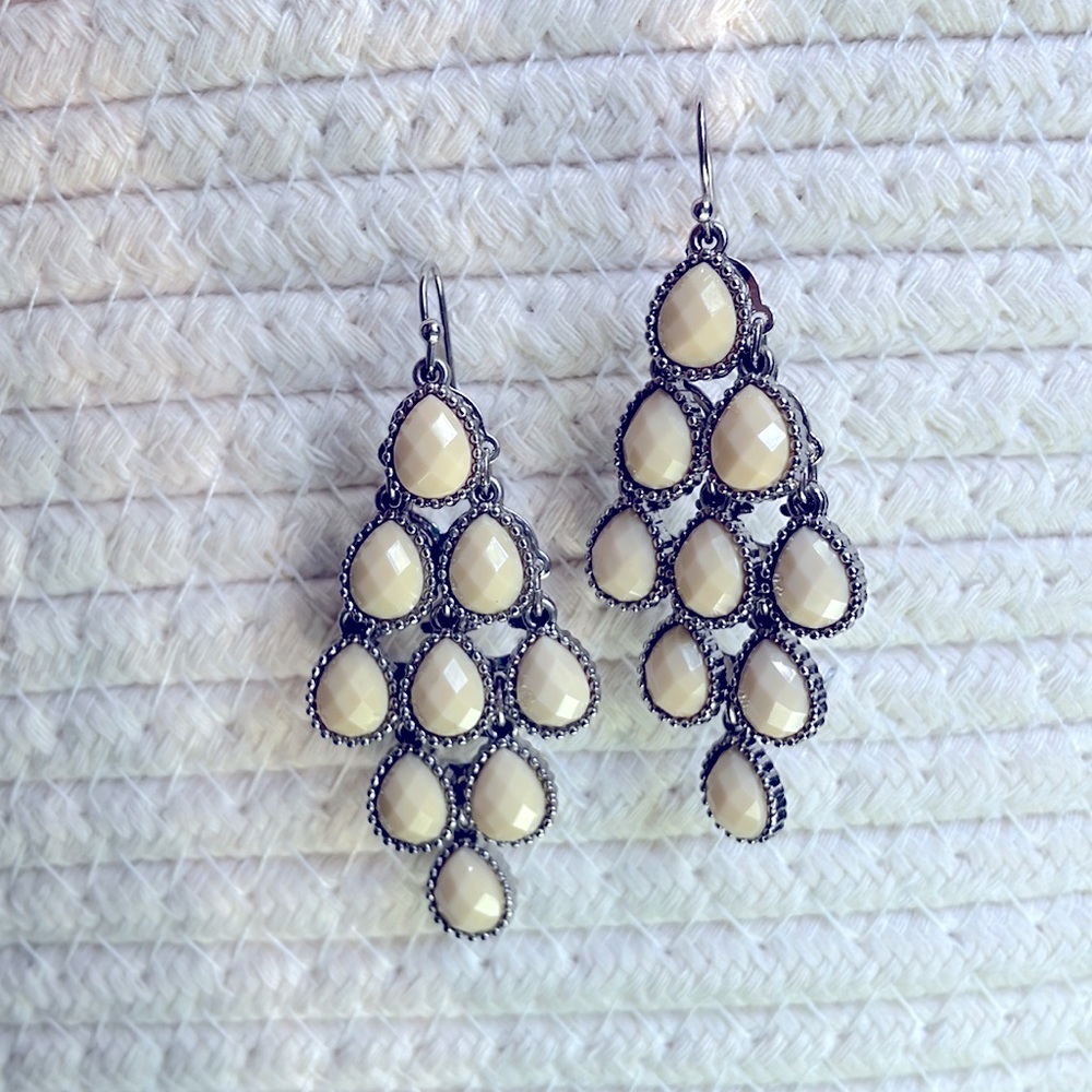 Vintage earrings with cascading cream colored gem cut stones